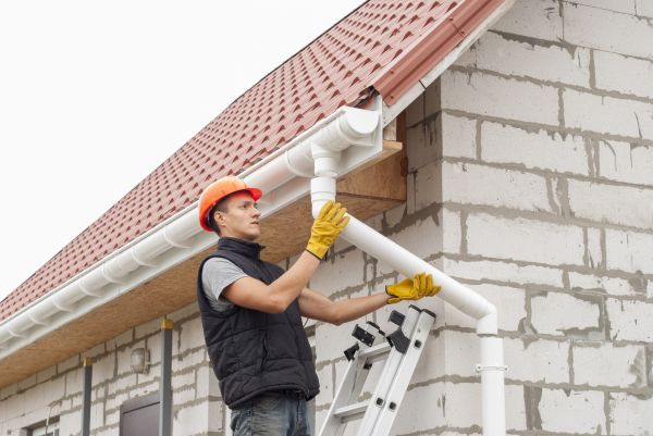 Professional Gutter Downspout Unclogging